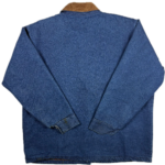 Back view of a vintage Adolphe Lafont blanket lined denim work jacket showing the faded blue denim and straight chore coat shape.
