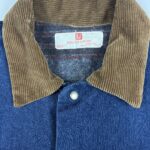 Close-up of the brown corduroy collar and Adolphe Lafont size L label on the USA made vintage denim jacket.